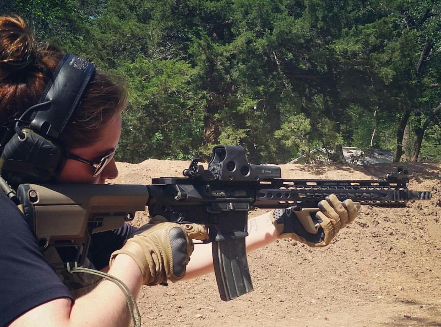 Brianna Phillips practicing with a firearm