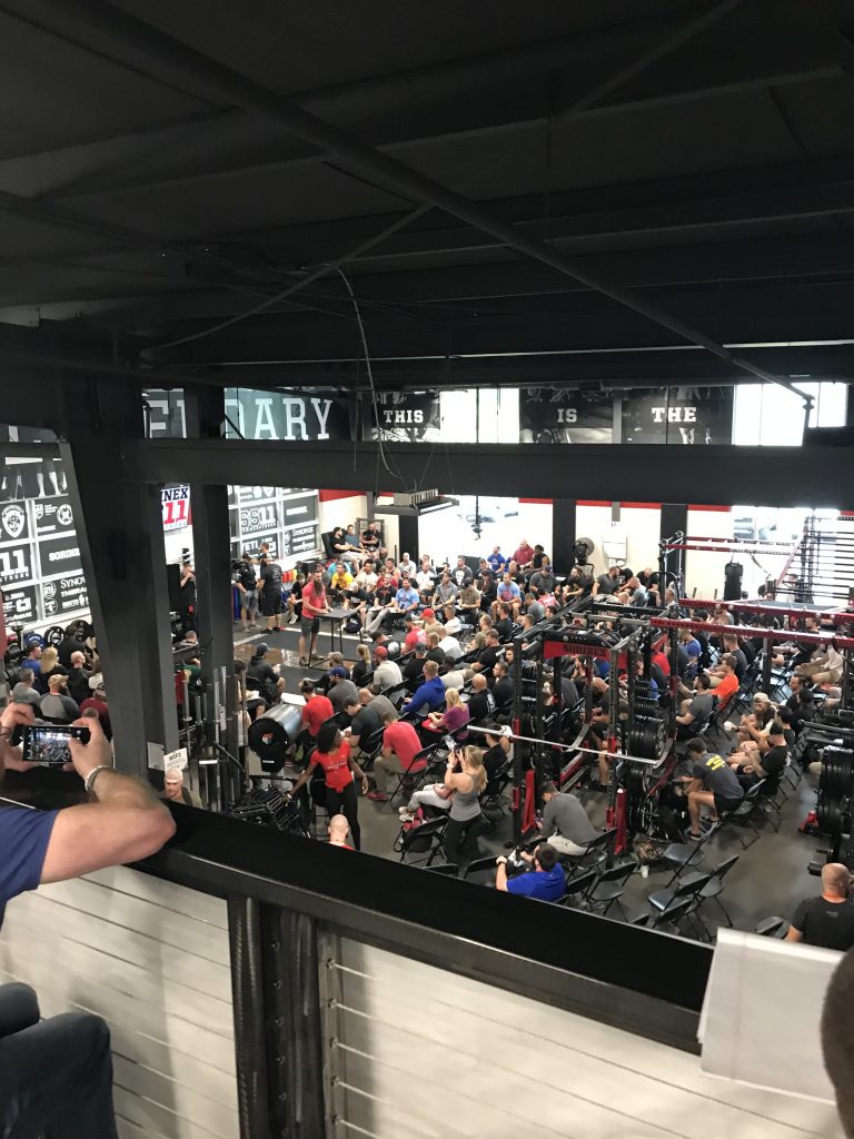 Inside of Sorinex with many people and exercise equipment