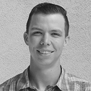 Close up of Caleb Tiller, a young man with a short haircut